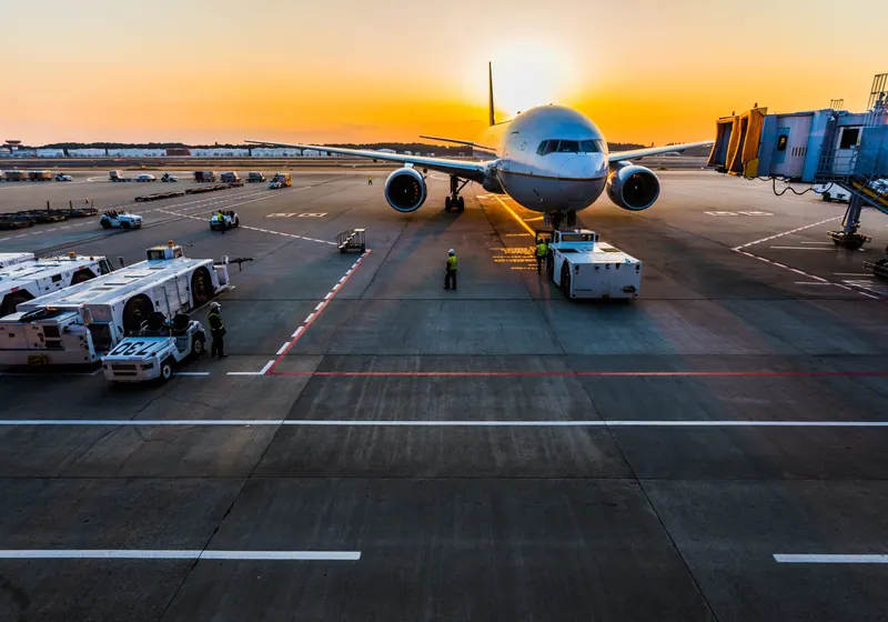 Cargo aircraft on the apron at sunset